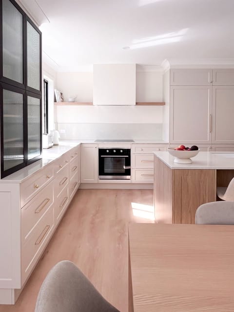 Kitchen : Tall storage, wide drawers and a central island give the kitchen practical space for longer stays and meal preparation.