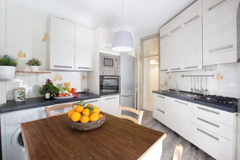 Apartment, Balcony, Partial Sea View | Private kitchen | Full-size fridge, microwave, oven, stovetop