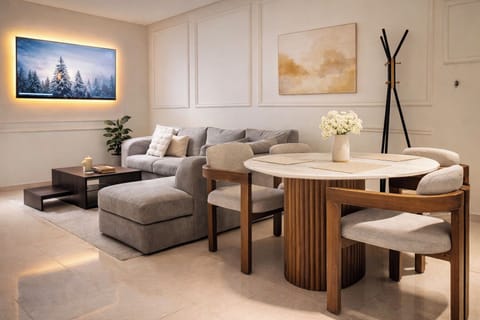 Comfort Apartment | Living area | Flat-screen TV