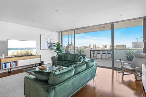 Floor-to-ceiling glass frames the outlook from every angle.