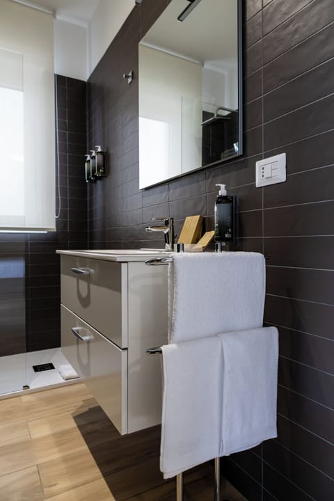 Double Room, Balcony | Bathroom | Shower, hair dryer, slippers, towels