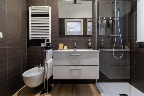 Double Room | Bathroom | Shower, hair dryer, slippers, towels