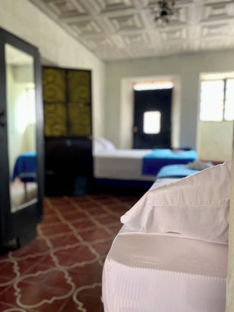 Economy Room, Mixed Dorm, Patio | Iron/ironing board (on request), WiFi (free), bed sheets