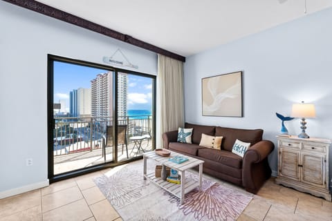 Relax in your bright living room with stunning ocean views and step onto your private balcony to soak in the tropical scenery.