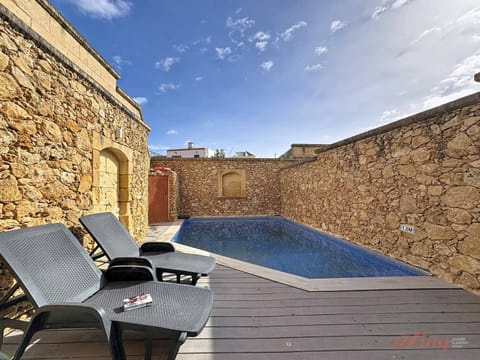 Sun Beds and Pool Area