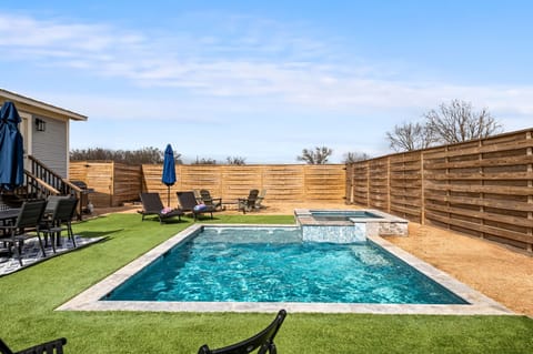 Lounge by the outdoor pool or soak in the hot tub while taking in scenic views of the surrounding countryside.