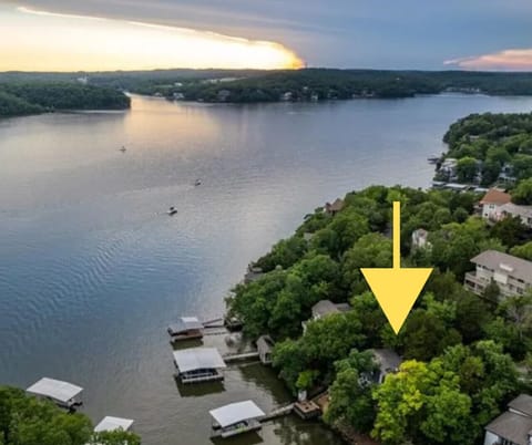 Lakefront oasis with private dock and stunning sunset views—your perfect getaway at Lake of the Ozarks!