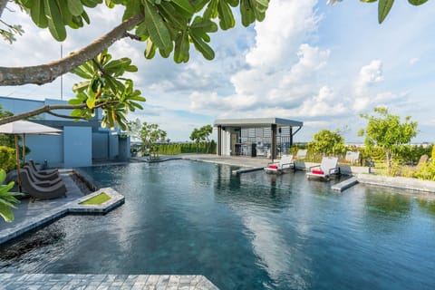 Outdoor pool, open 7:00 AM to 9:00 PM, free cabanas, sun loungers