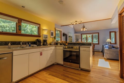 Kitchen - Kitchen leads to the dining room and living room.