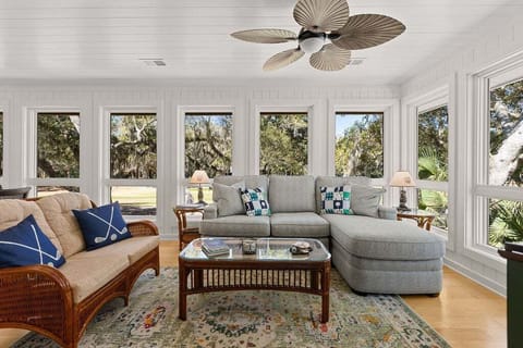 Light and bright sunroom overlooking fairway of Crooked Oaks #2