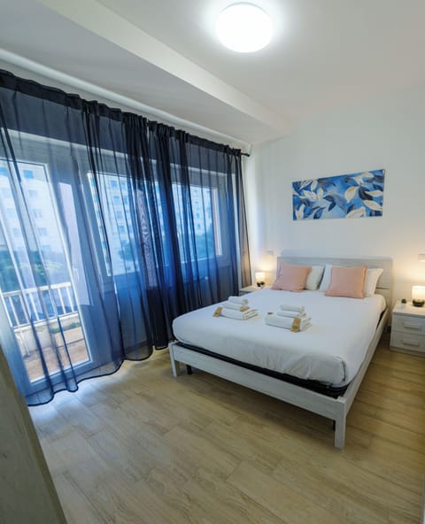 Double Room, Balcony, City View | Iron/ironing board, free WiFi, bed sheets