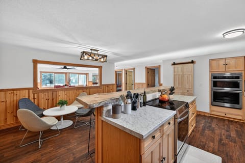 The kitchen has a teapot, coffee bar, waffle bar and popcorn options!