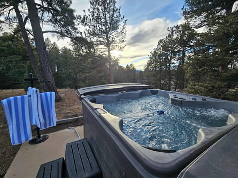 Relax under the stars in the hot tub.