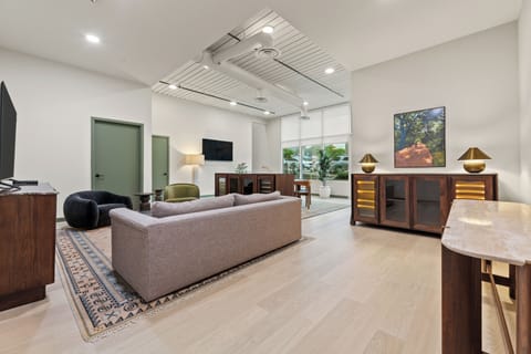 Relax in this thoughtfully designed lounge space featuring cozy seating, modern finishes, and plenty of room to unwind after a day of exploring.