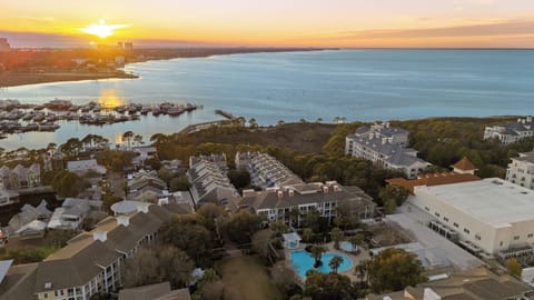 Golden-hour aerial views of Destin’s coastline and harbor.