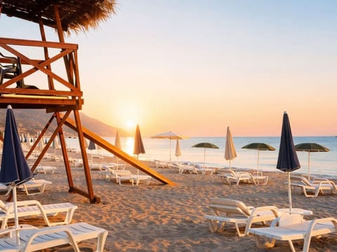 Private beach, white sand, beach umbrellas, beach volleyball
