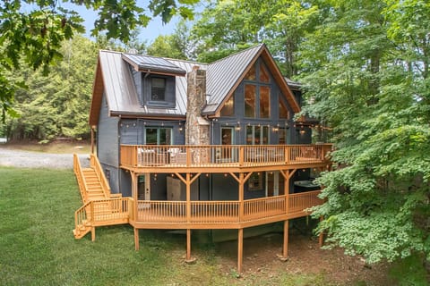 Escape to your own A-frame retreat in the trees. Unwind by the fire pit, relax on the wraparound deck, and fall asleep to the sound of the forest. Every evening here feels like a getaway within the getaway.