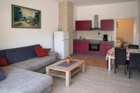 Family Apartment, Multiple Bedrooms (Pool Apt 3 - Novi Vinodolski (Ground)) | Living area | 21-inch flat-screen TV with digital channels