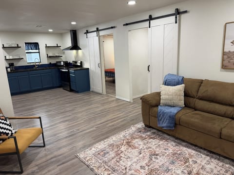 Unwind in this stylish living space — perfect for quiet mornings with coffee or evenings in.