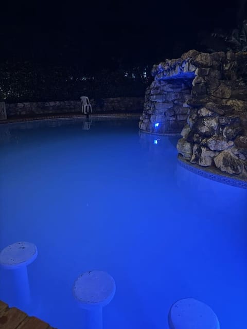 Relax in the shared pool surrounded by nature and tranquility