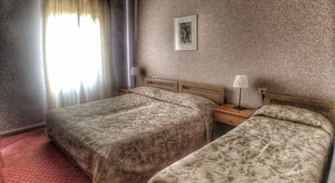 Desk, rollaway beds, free WiFi, bed sheets