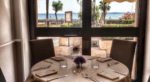 Breakfast, lunch, dinner served; Italian cuisine, alfresco dining 