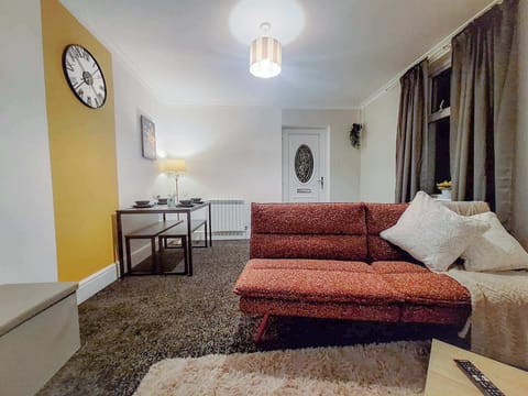Comfortable lounge with spacious seating, ideal for unwinding in the evening or watching TV after a busy day.
