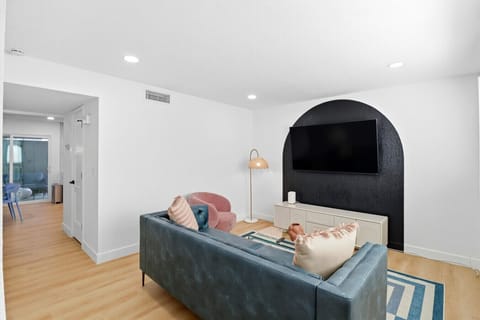 Stylish and cozy Living Room with TV