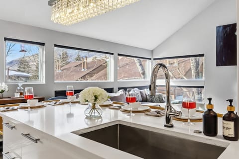 Updated kitchen with stainless steel appliances and everything needed to cook a meal at the home after a day in the mountains.