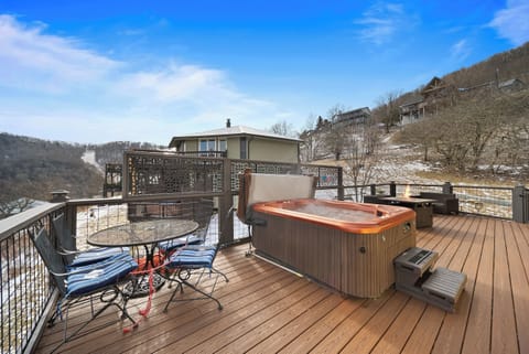 Large Decked Area with Hot Tub, Fire Table, Bistro-Style Iron Table