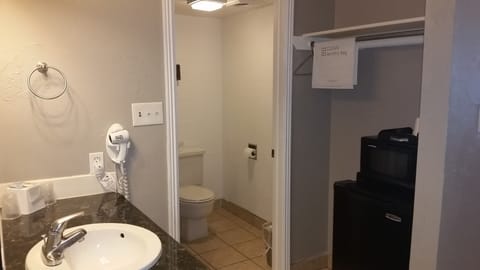 Room, 2 Queen Beds, Non Smoking | Bathroom | Combined shower/tub, free toiletries, hair dryer, towels