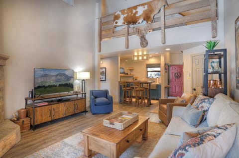 Cozy up in style- this living room is perfect for relaxation and gathering.