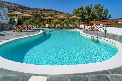 Outdoor pool, open 11:00 AM to 8:00 PM, pool umbrellas, sun loungers