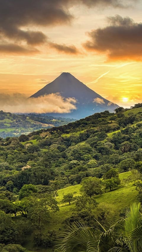 Stunning View: Watch sunsets over Arenal Volcano from your private patio paradise!