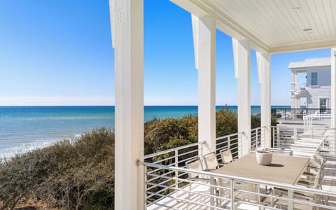 Your private balcony frames stunning gulf views where turquoise waters meet endless blue skies, creating the perfect spot for morning coffee or sunset relaxation.