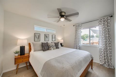 Drift off to sleep in your serene bedroom, where soft linens and gentle lighting create the perfect retreat after your day.
