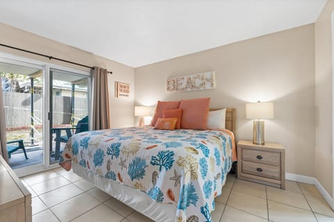 Bedroom - King Bed - Patio Access - Smart TV & Cable – Attached Full Bathroom – Linens Provided