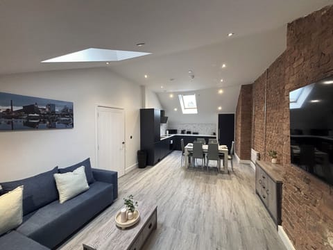 Superior Apartment, 2 Bedrooms | Living area | 60-inch Smart TV with satellite channels