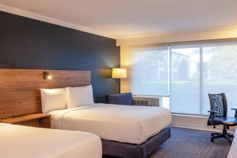 Room, 2 Double Beds | In-room safe, desk, blackout drapes, iron/ironing board