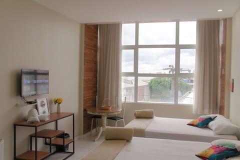 Deluxe Quadruple Room, 1 Bedroom, Air conditioning | WiFi (free), bed sheets