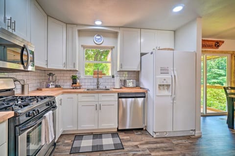 Kitchen | Stainless Appliances | White Cabinets & Butcher Block Island
