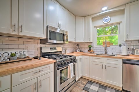 Kitchen | Stainless Appliances | White Cabinets & Butcher Block Island