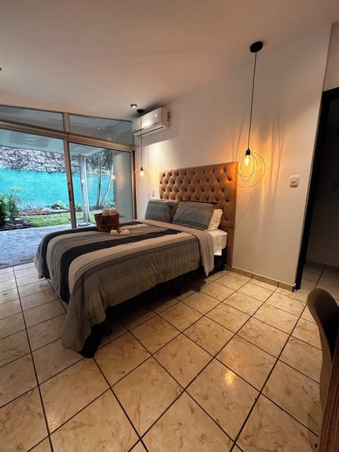Deluxe Room, Patio | Desk, laptop workspace, iron/ironing board, WiFi (free)