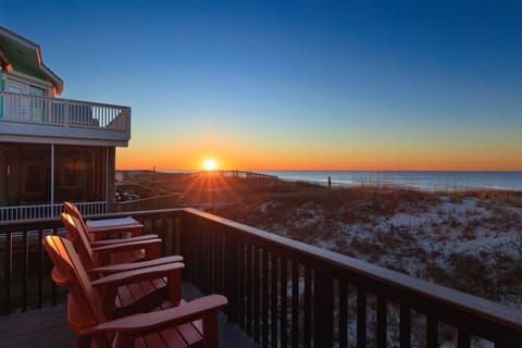 Wake up to this sunrise from your private deck with front-row seats to the ocean.