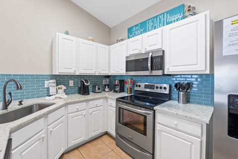 Plenty of beautiful new quartz counters for easy prep.