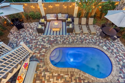 Spacious, upscale backyard retreat with a sparkling pool made for unforgettable vacation moments.