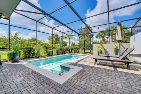 Big pool with outdoor seating / dining spaces