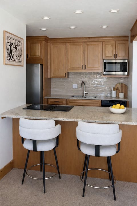 Kitchen with all cooking and dining supplies. Plus microwave and toaster oven.
