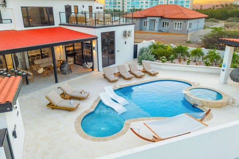 Sun-Kissed Luxury Villa with Private Pool, Lounge Deck, and Tropical Vibes—Your Perfect Escape for Relaxation and Stylish Getaways
