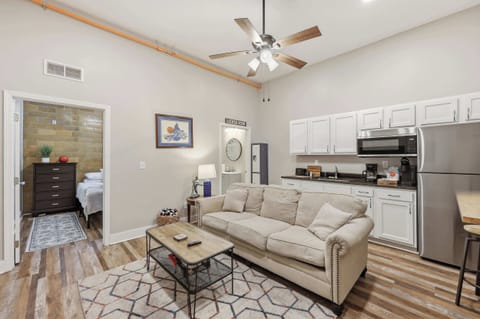 Unit 3 Living Area: Relax in this cozy living space with kitchenette, perfect for unwinding after exploring Churchill Downs and Louisville’s top eateries nearby.